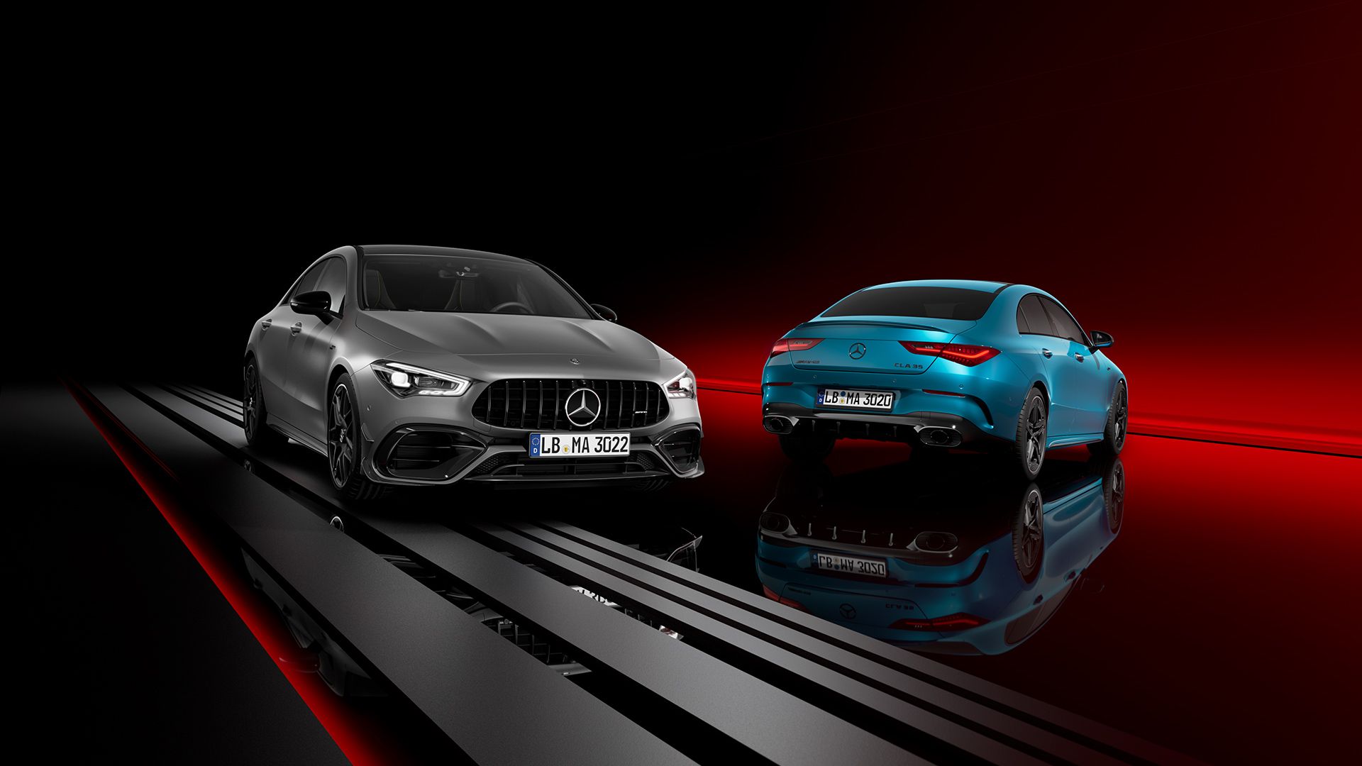 The Mercedes-AMG CLA 35 Coupé and Mercedes-AMG CLA 45 S Coupé standing next to each other.