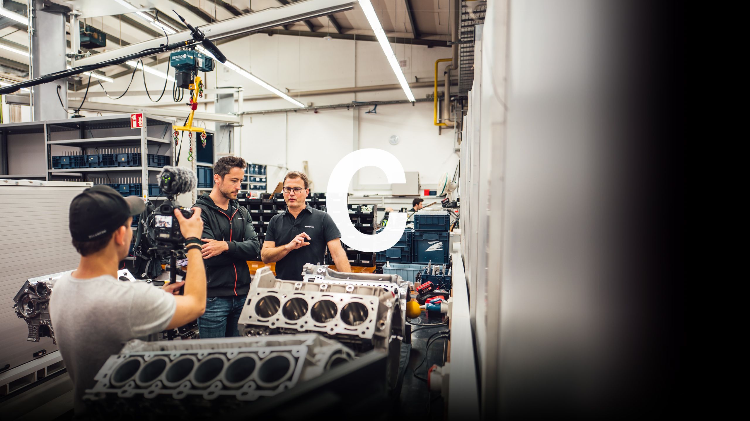 Felix and Jens examine an AMG cylinder in the factory