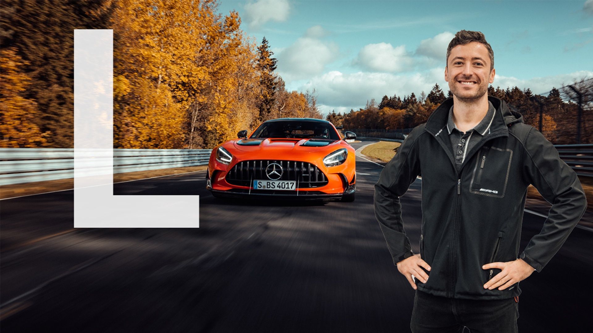 Felix in front of a Mercedes-AMG GT Black Series