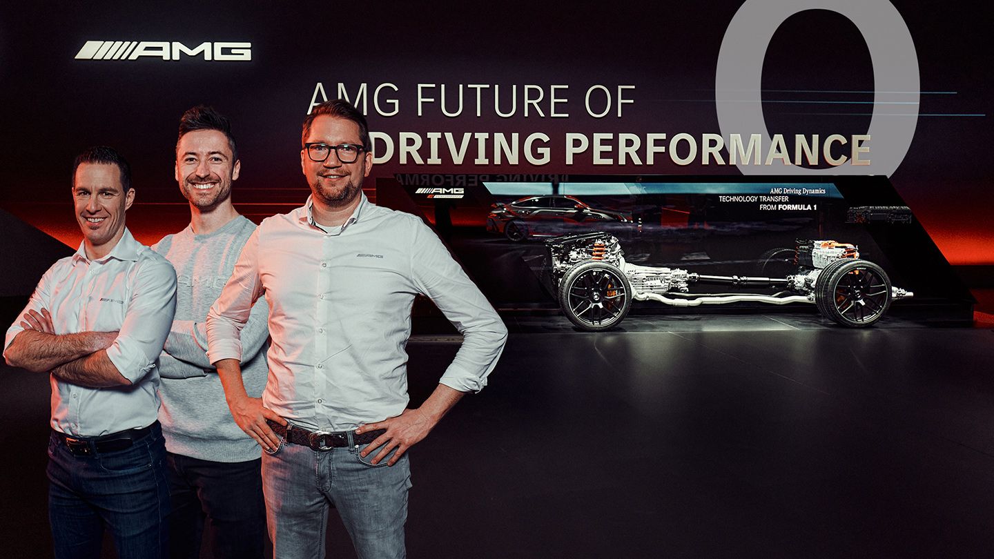 Felix, Denis and Jochen in front of the high performance battery of a Mercedes-AMG racing car