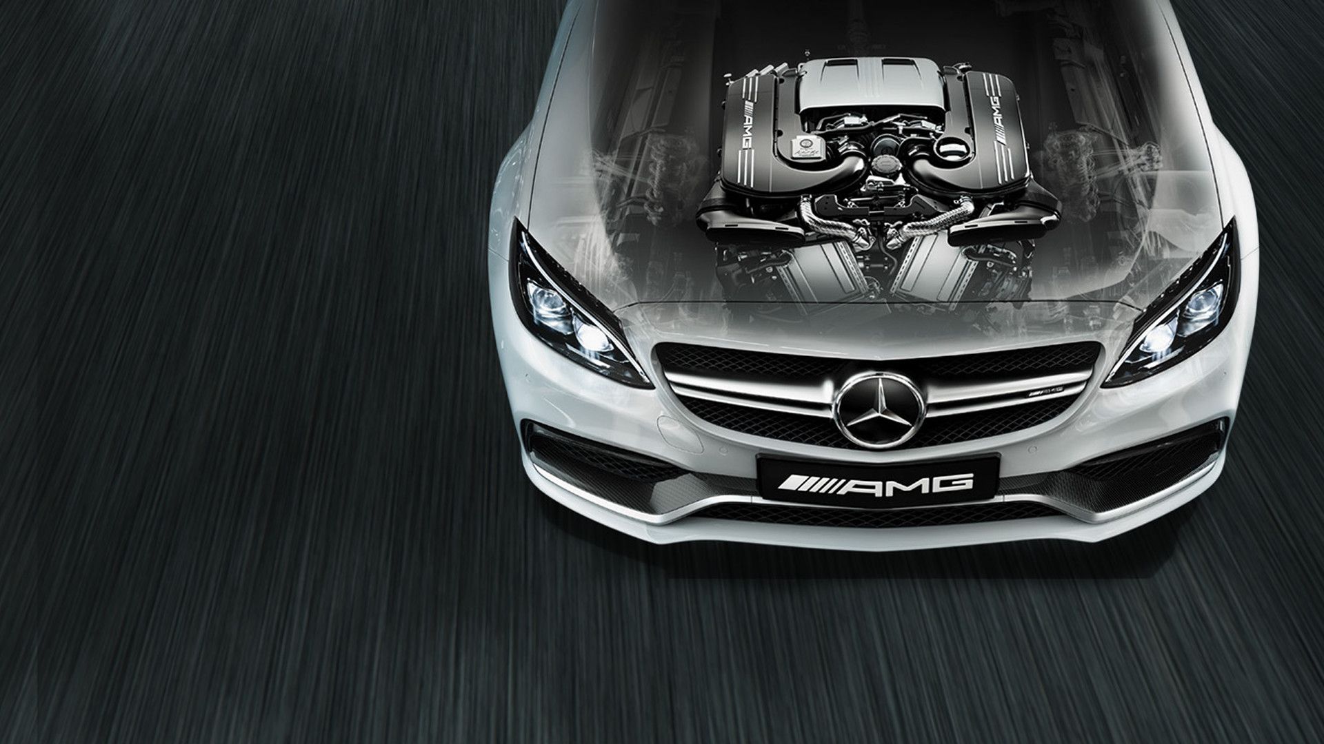 Bird view on the transparent bonnet of a Mercedes-AMG revealing the engine