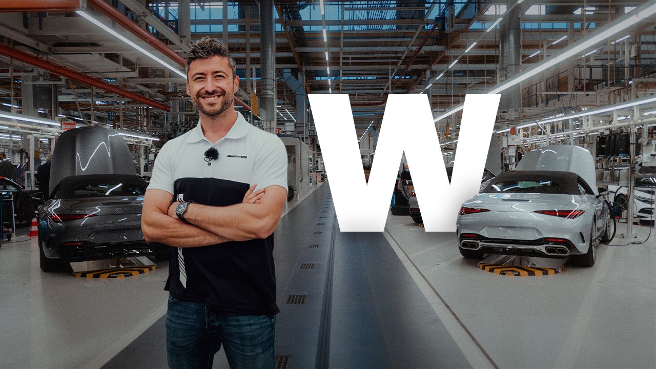 Felix next to two Mercedes-AMG vehicles at the Bremen plant