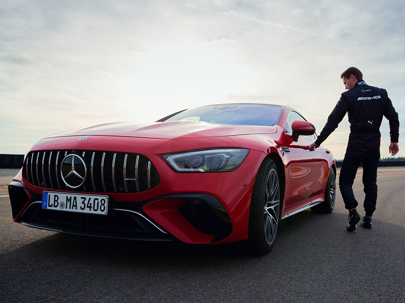 Maro Engel getting into a Mercedes-AMG GT 63 S