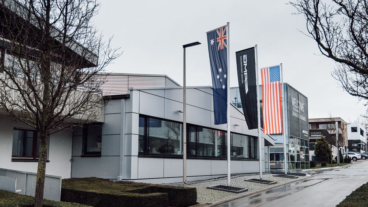 Flags in front of the AMG plant in Affalterbach