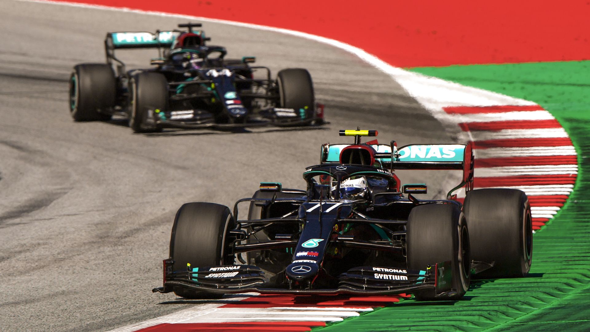 Racing vehicles on a race track