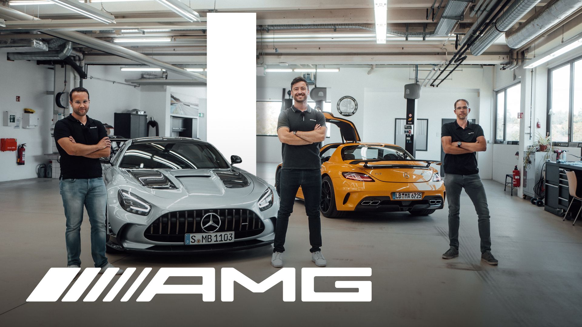 Felix, Klaus and Stefan in front of a Mercedes-AMG GT Black Series and a Mercedes-AMG Track Series