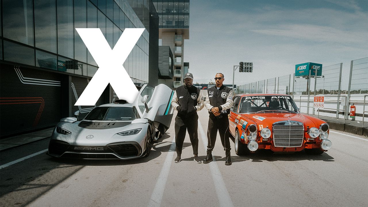 Will.i.am and Lewis Hamilton stand next to a Mercedes-AMG One and a Mercedes 300 SEL