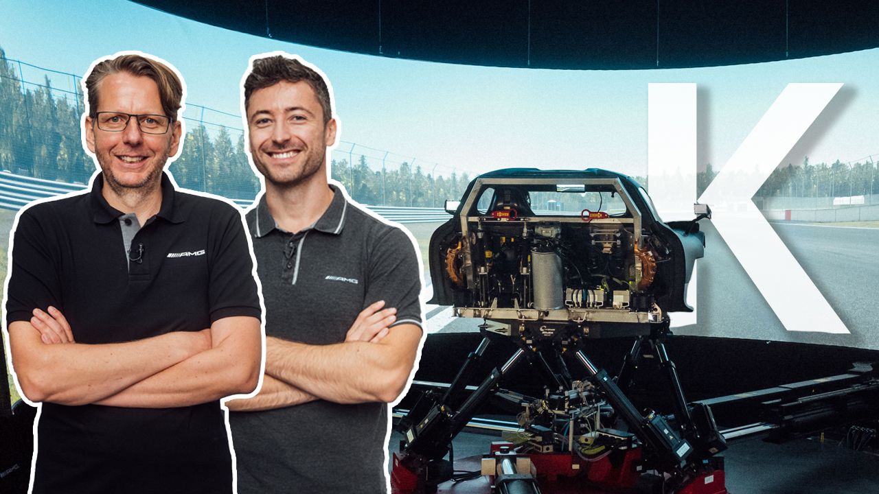 Felix and an AMG engineer in front of a simulator