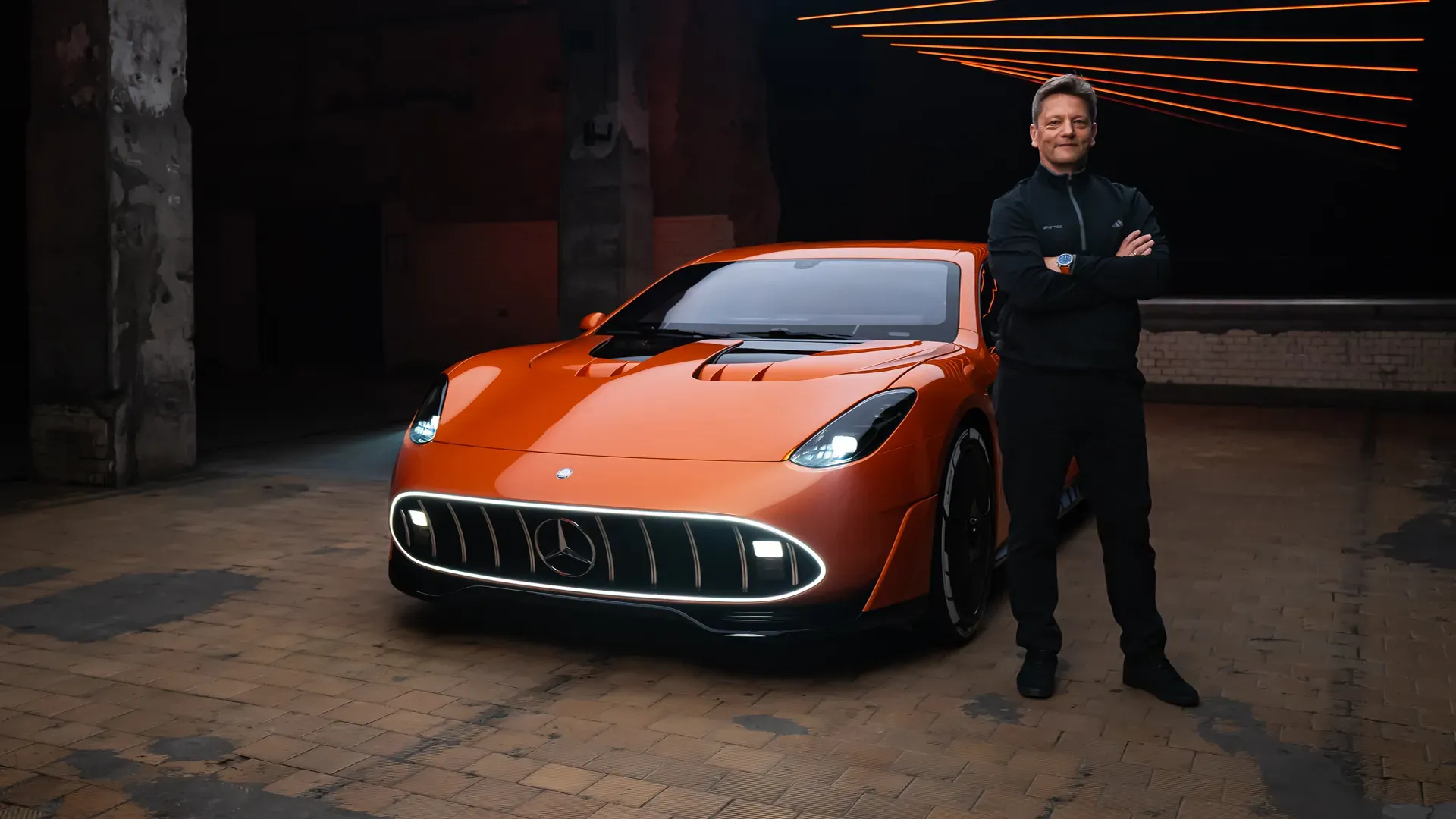 Chief engineer of the AMG.EA platform Oliver Wiech stands in front of the CONCEPT AMG GT XX