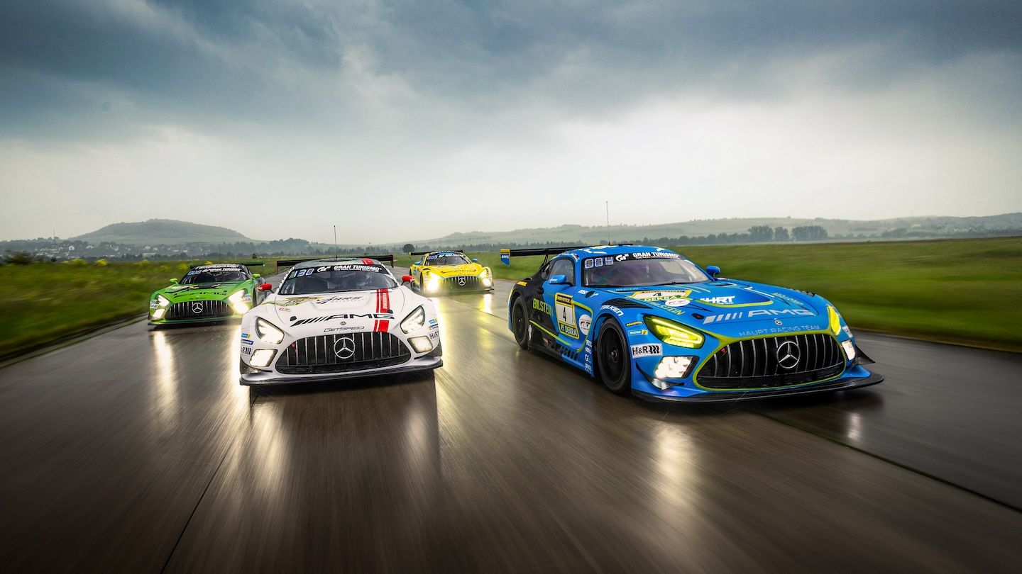 Several Mercedes-AMG GT Sport vehicles while driving on the race track