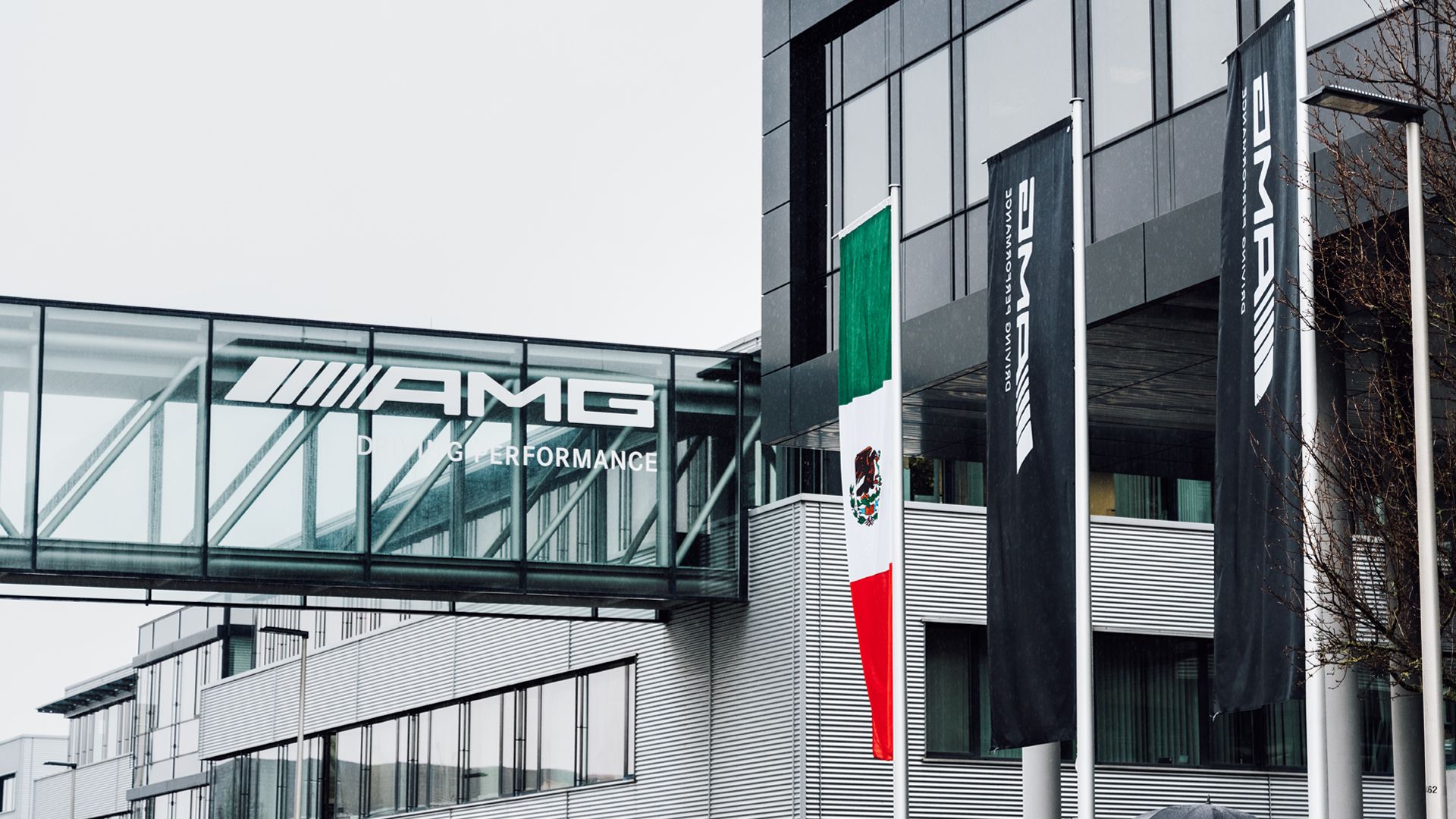 Flags in front of the AMG plant in Affalterbach