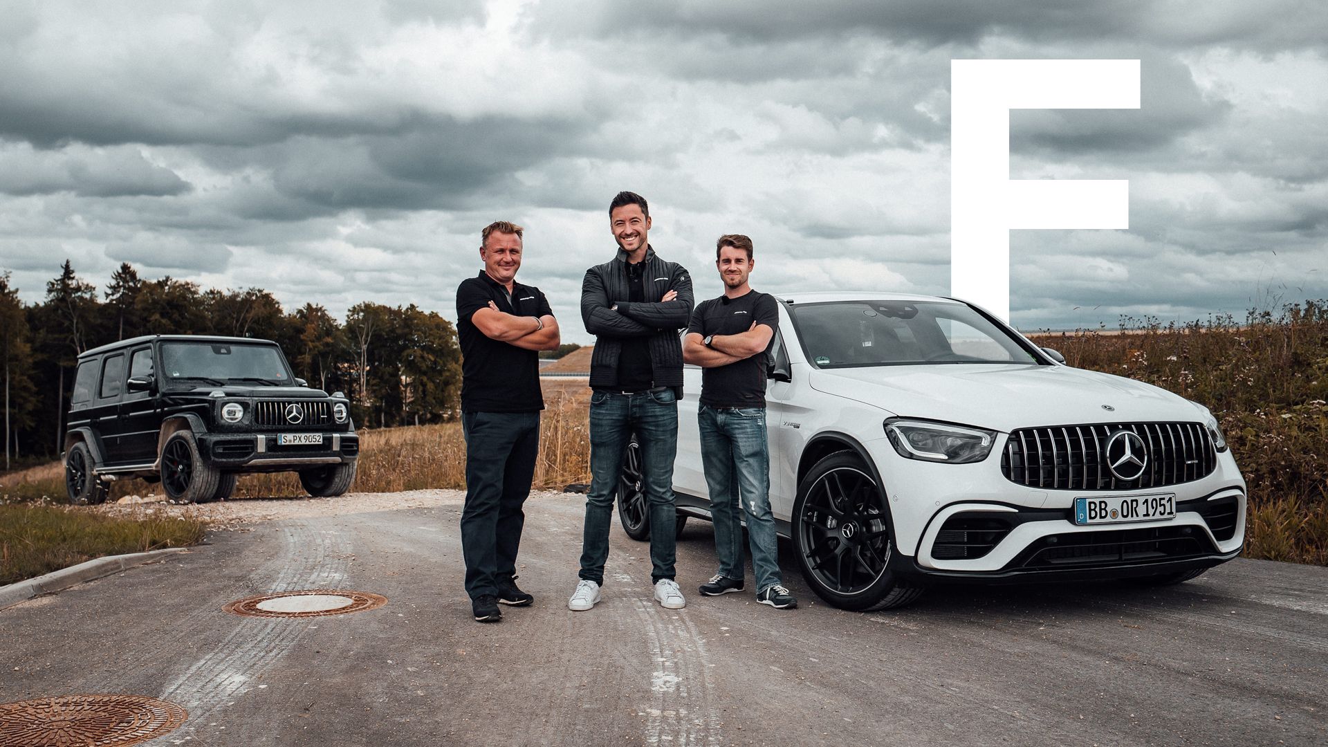 Felix, Marc and Hannes in front of a Mercedes-AMG GLC 63 4MATIC+ and a Mercedes-AMG G 63