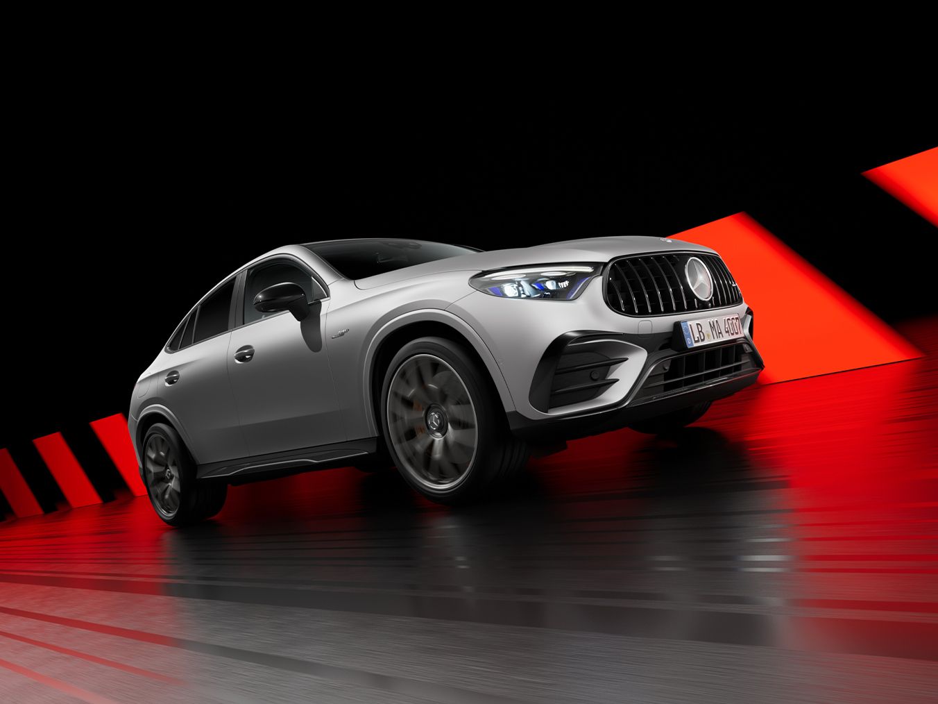 Mercedes-AMG GLC Coupe 63 S E from the side in the showroom.